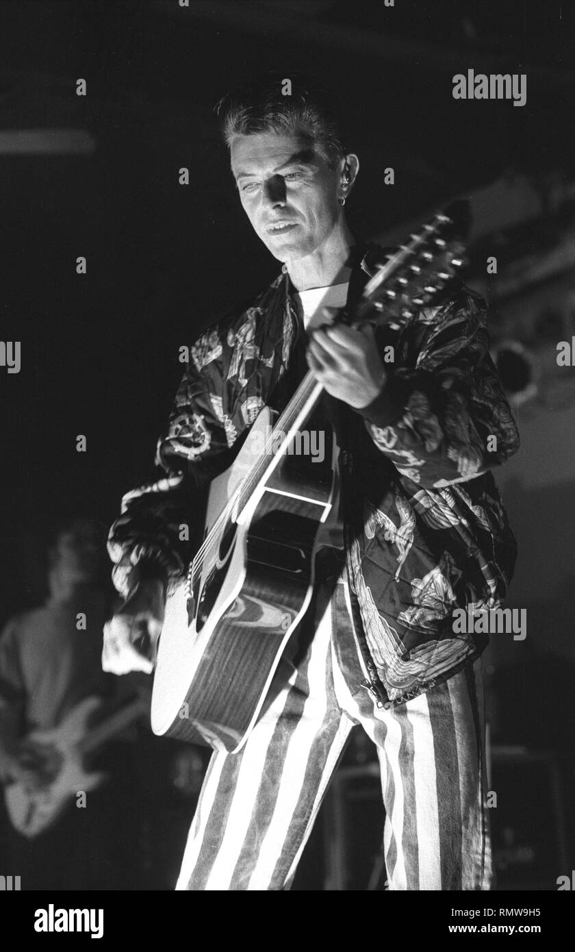 Singer & songwriter David Bowie is shown performing on stage during a 'live' concert appearance with Tin Machine. Stock Photo