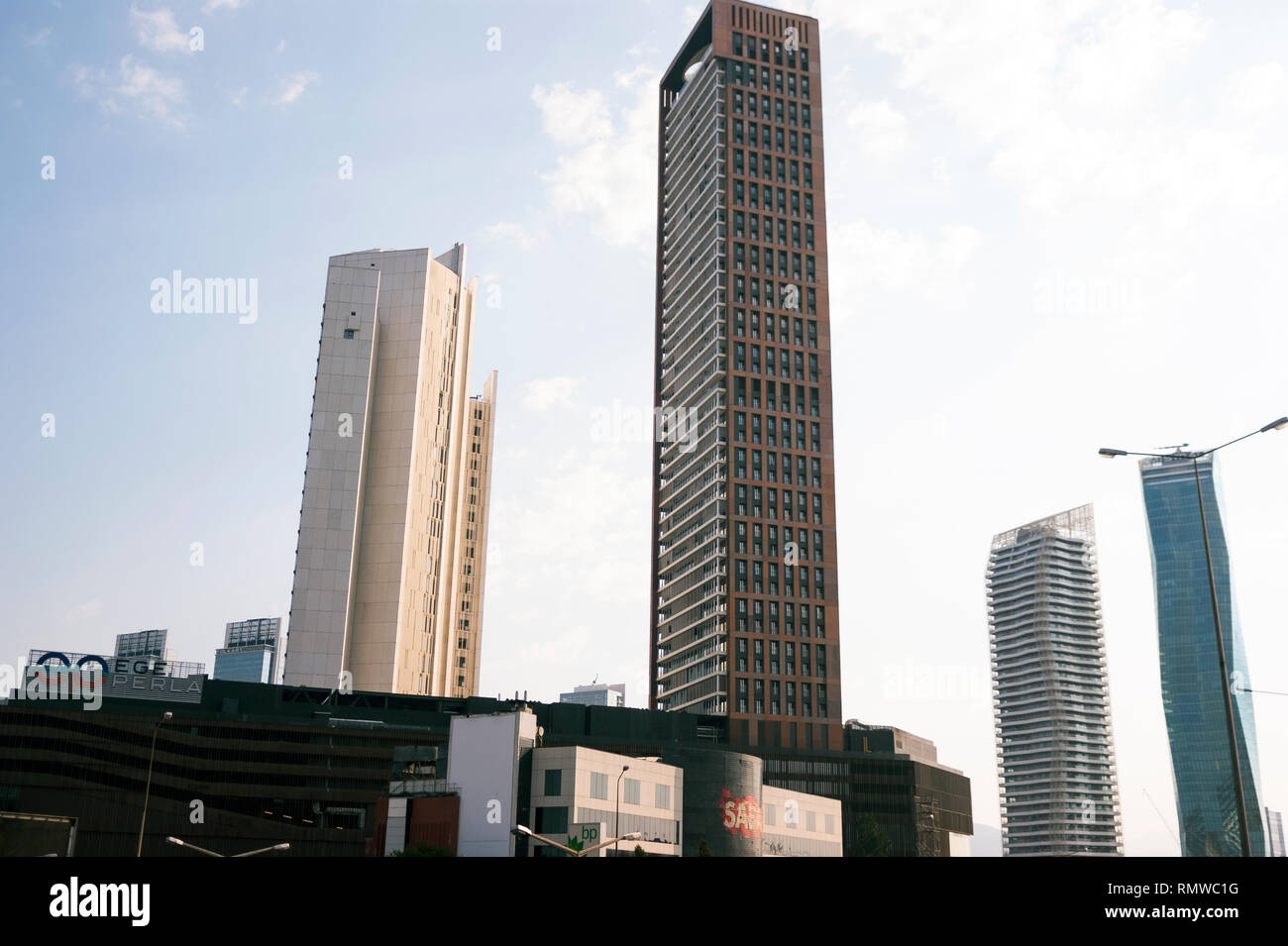 Izmir, Turkey - August  8, 2018: Mistral and Ege perla towers view from Altinyol Izmir with Sabah Newspaper office building. Stock Photo