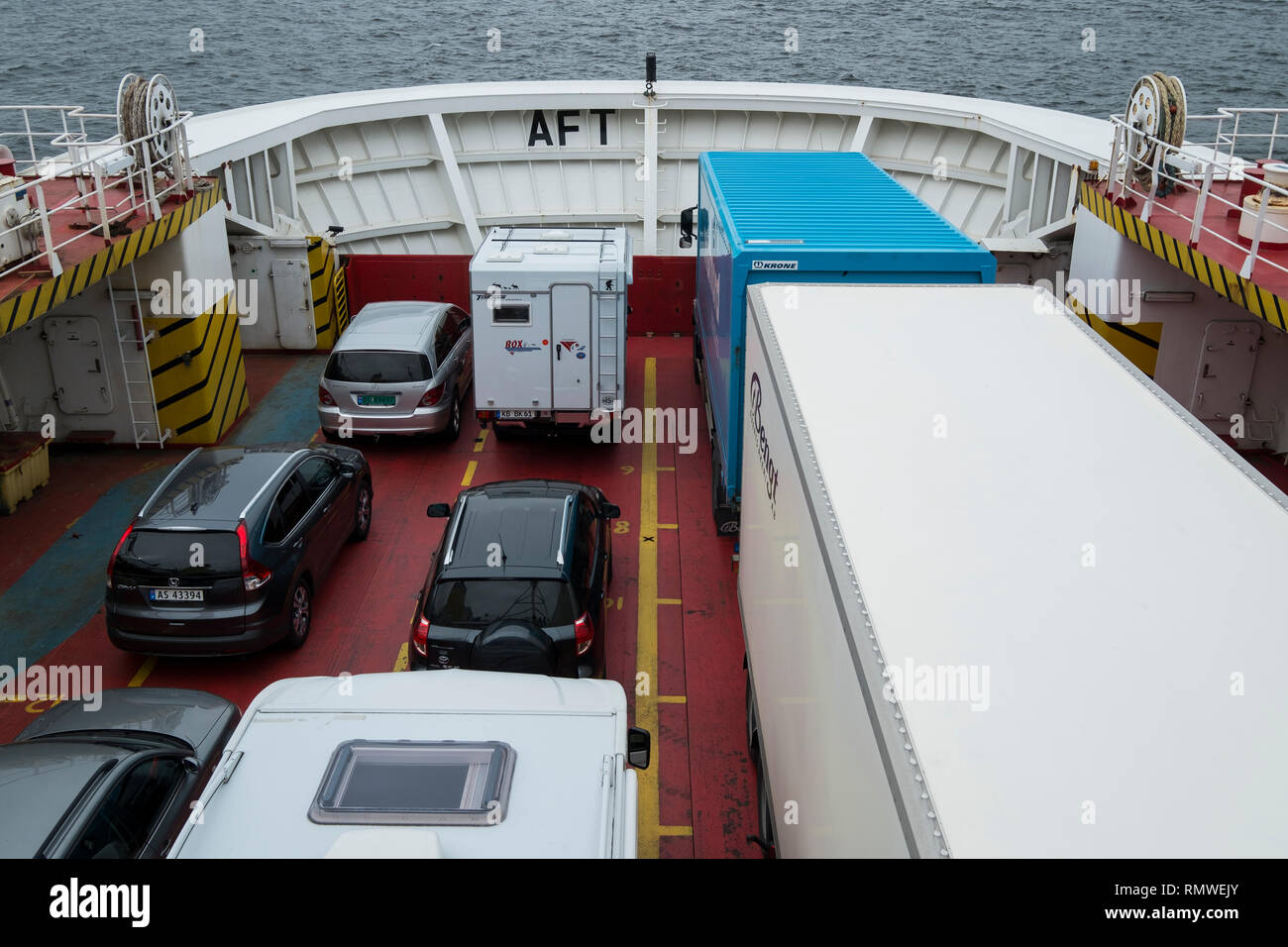 The vehicle deck of the ferry that runs between Moss and Horten in Norway. Stock Photo
