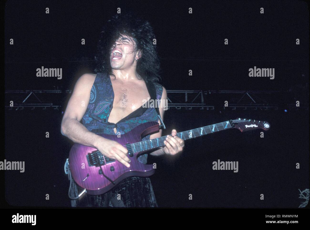 Guitarist Stevie Salas Is Shown Performing On Stage During A Live Concert Appearance Stock Photo Alamy