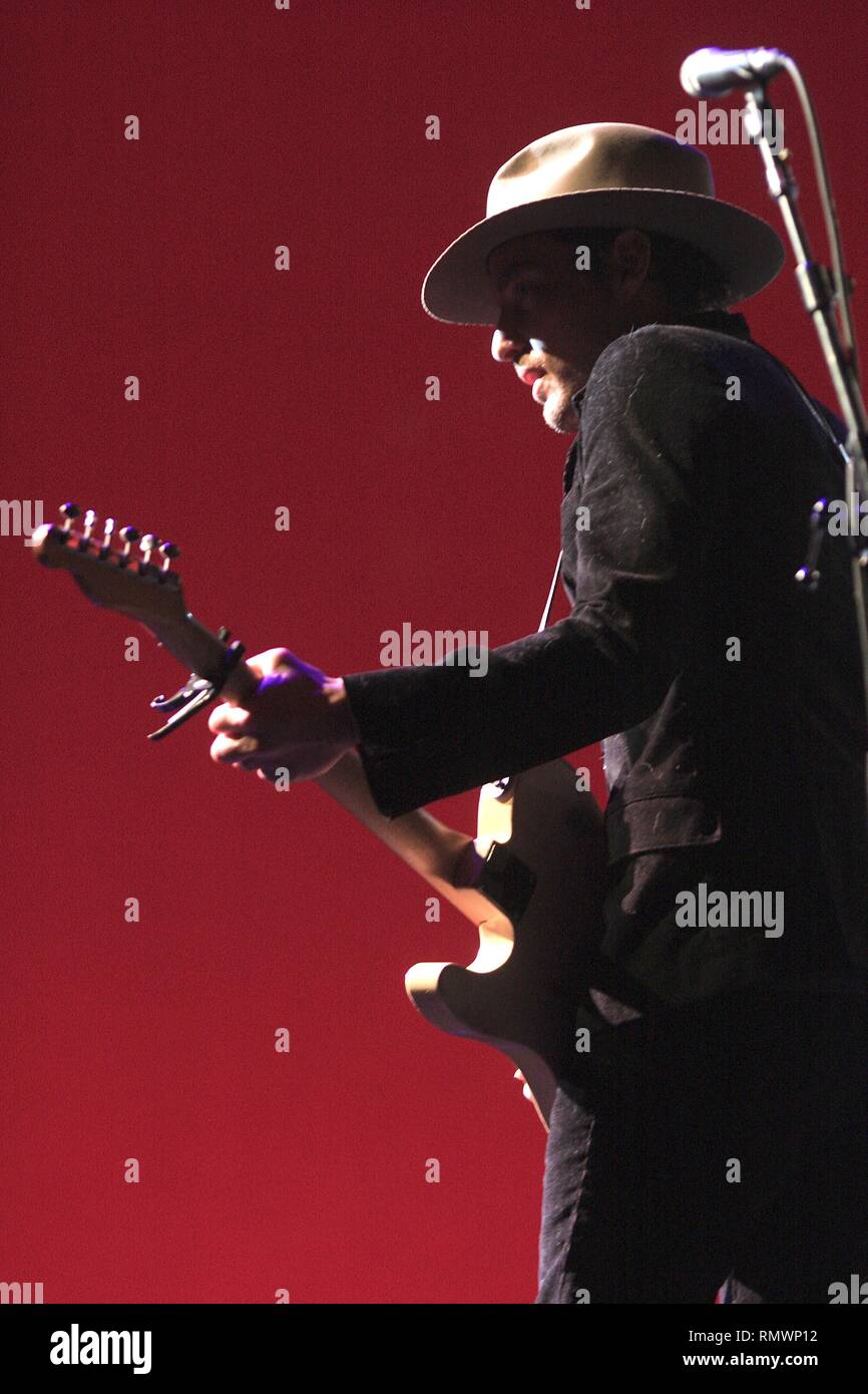 Singer, songwriter and guitarist Jakob Dylan of the Grammy Award winning rock band The Wallflowers is shown performing on stage during a 'live' concert appearance. Stock Photo