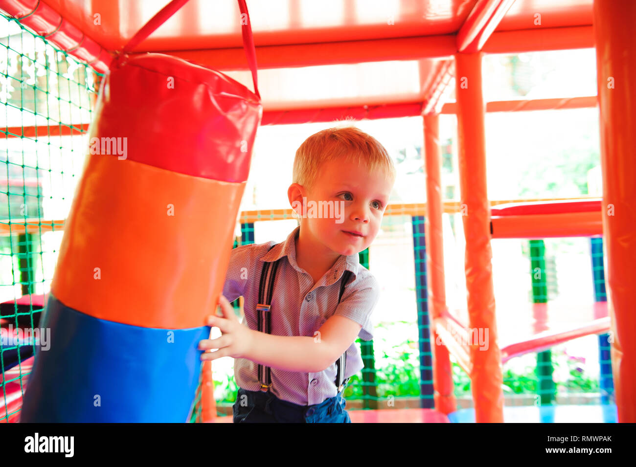 Indoor playground with colorful plastic balls for children. Stock Photo