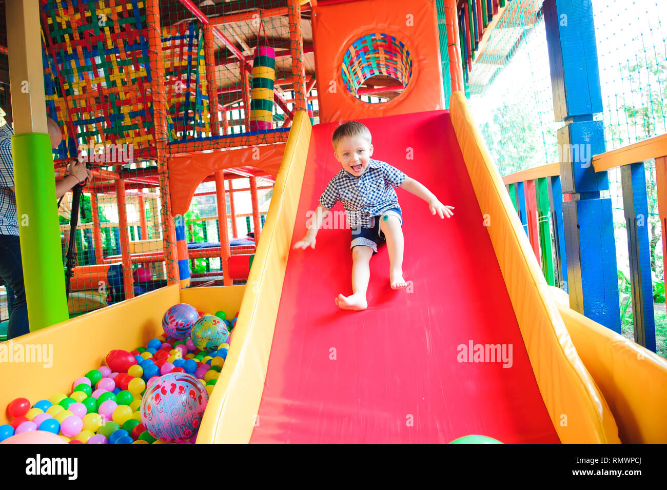Indoor playground with colorful plastic balls for children Stock Photo