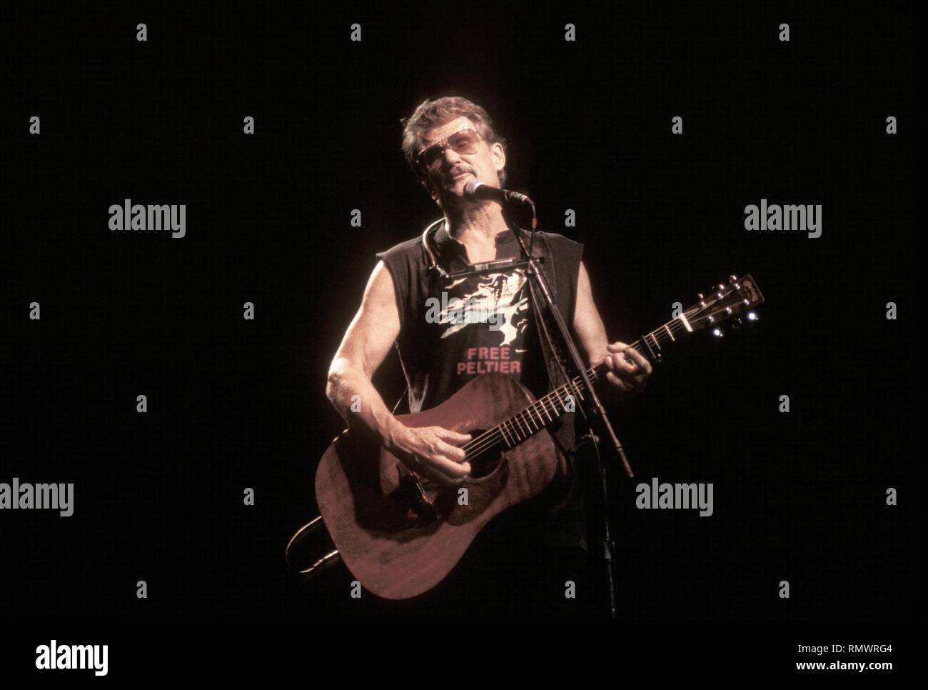 Singer, songwriter, actor, and writer Kris Kristofferson is performing on stage during a 'live' concert appearance. Stock Photo