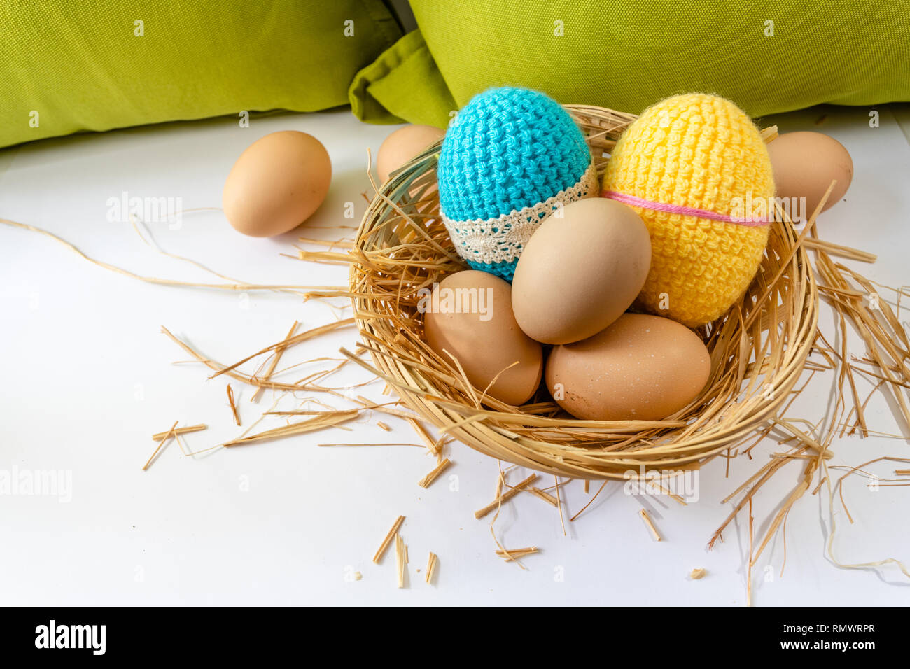 Easter eggs decoration, eggs in the nest, springtime rural composition. selective focus. Stock Photo