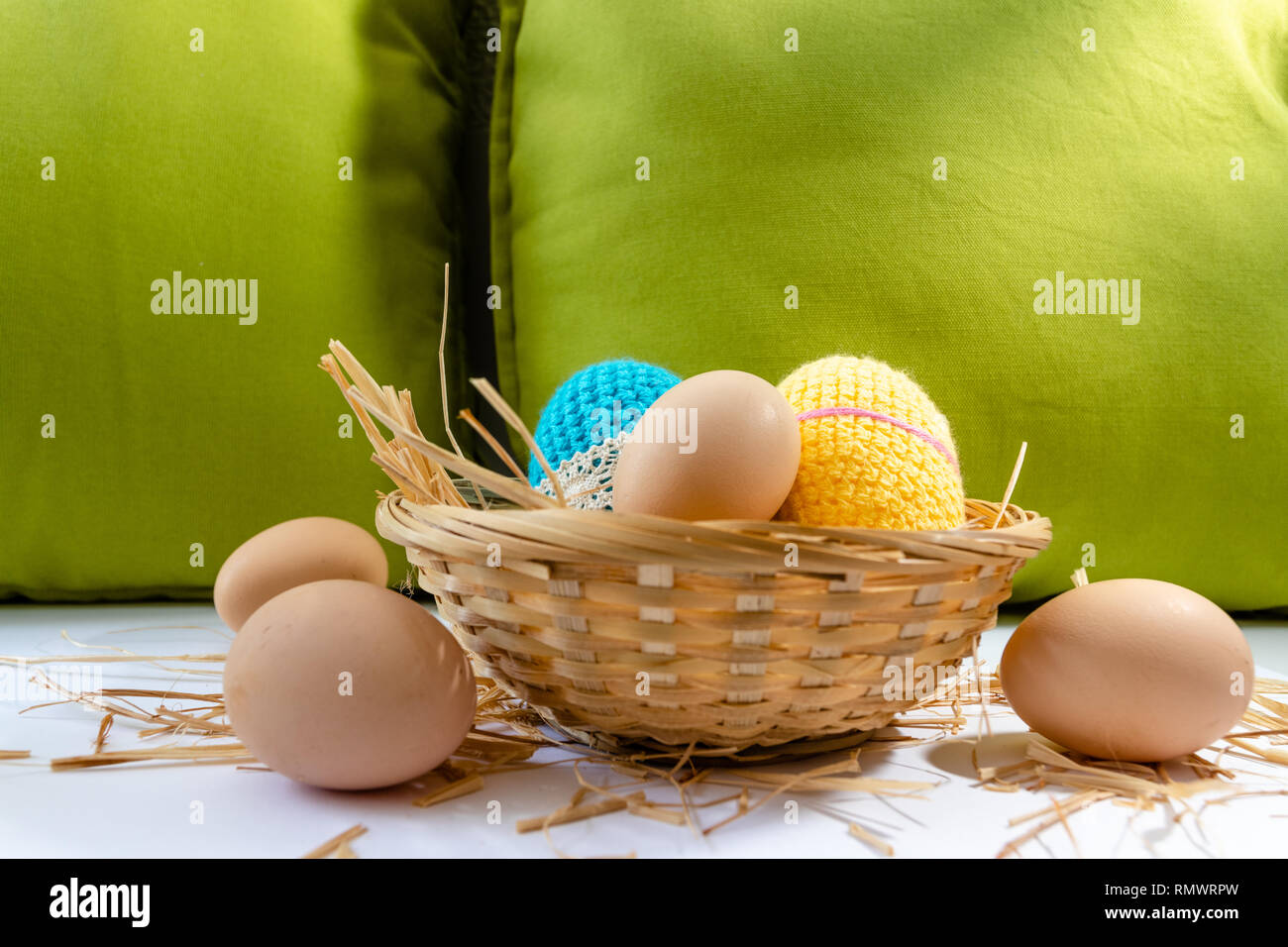 Easter eggs decoration, eggs in the nest, springtime rural composition. selective focus. Stock Photo