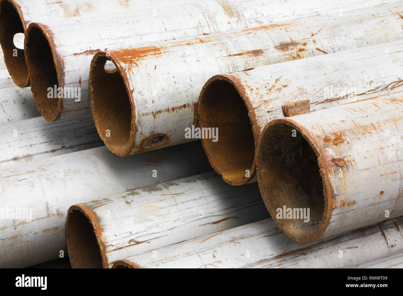 Close-up of rusted steel pipes with coat of primer paint Stock Photo