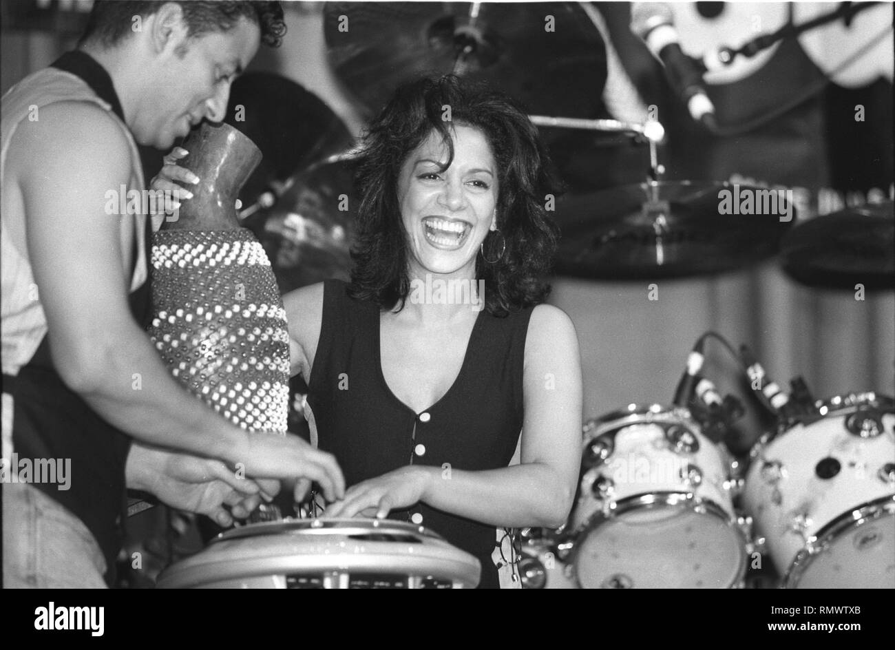 Sheila Escovedo, best known by her stage name Sheila E., is a musician, perhaps best known for her work with Prince and Ringo Starr, is shown during a percussion demonstration clinic. Stock Photo