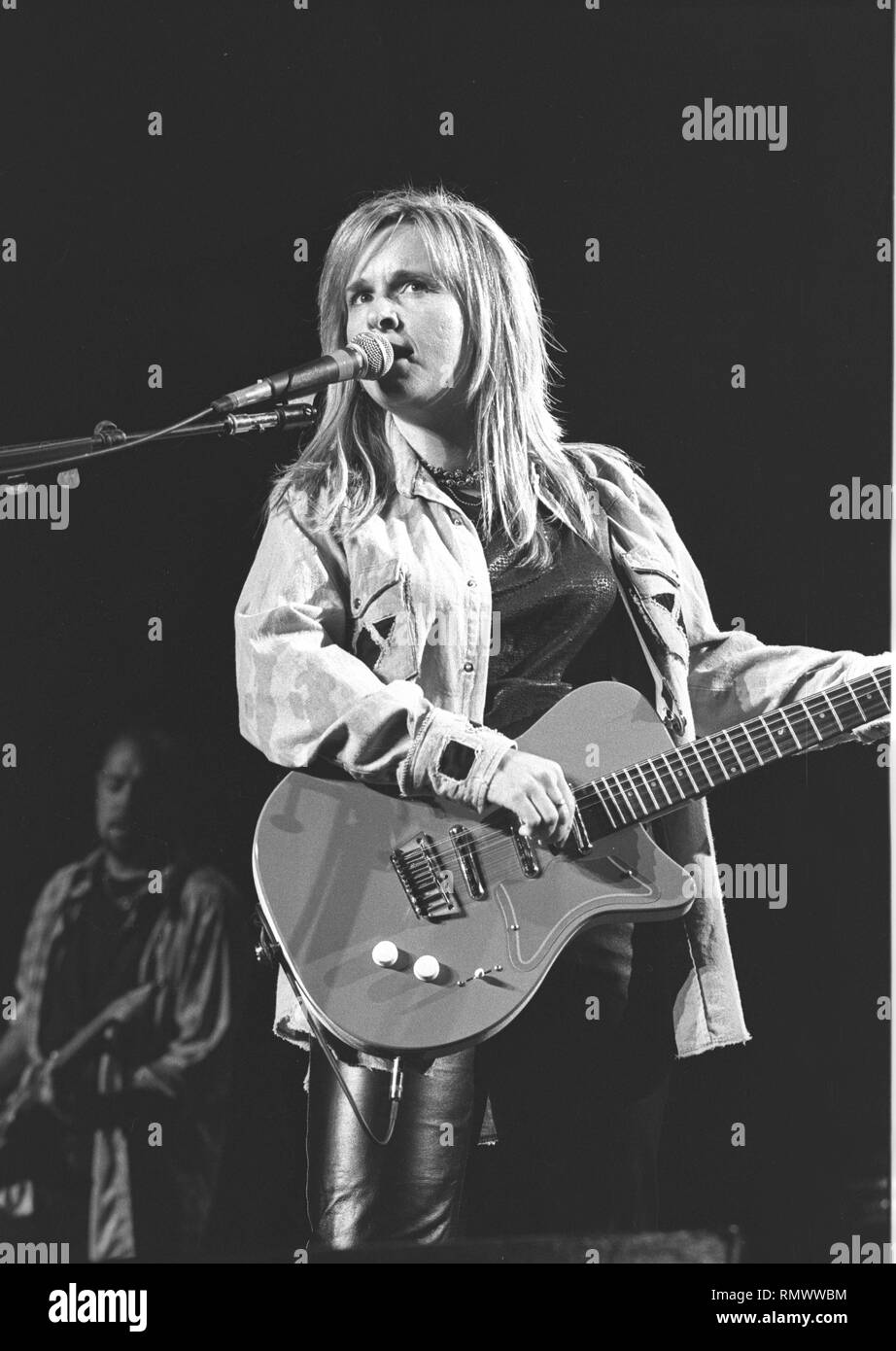 Musician Melissa Etheridge is shown performing on stage during a "live