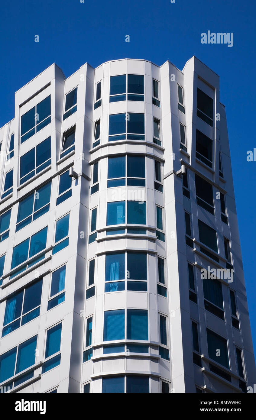 Modern architectural building against a blue sky background Stock Photo ...