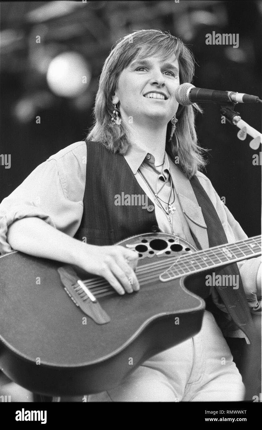 Musician Melissa Etheridge is shown performing on stage during a "live