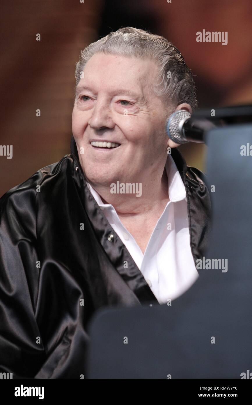 Rock ' Roll legend Jerry Lee Lewis is shown performing on stage during his 'live' concert appearance during Farm Aid 2008. Stock Photo
