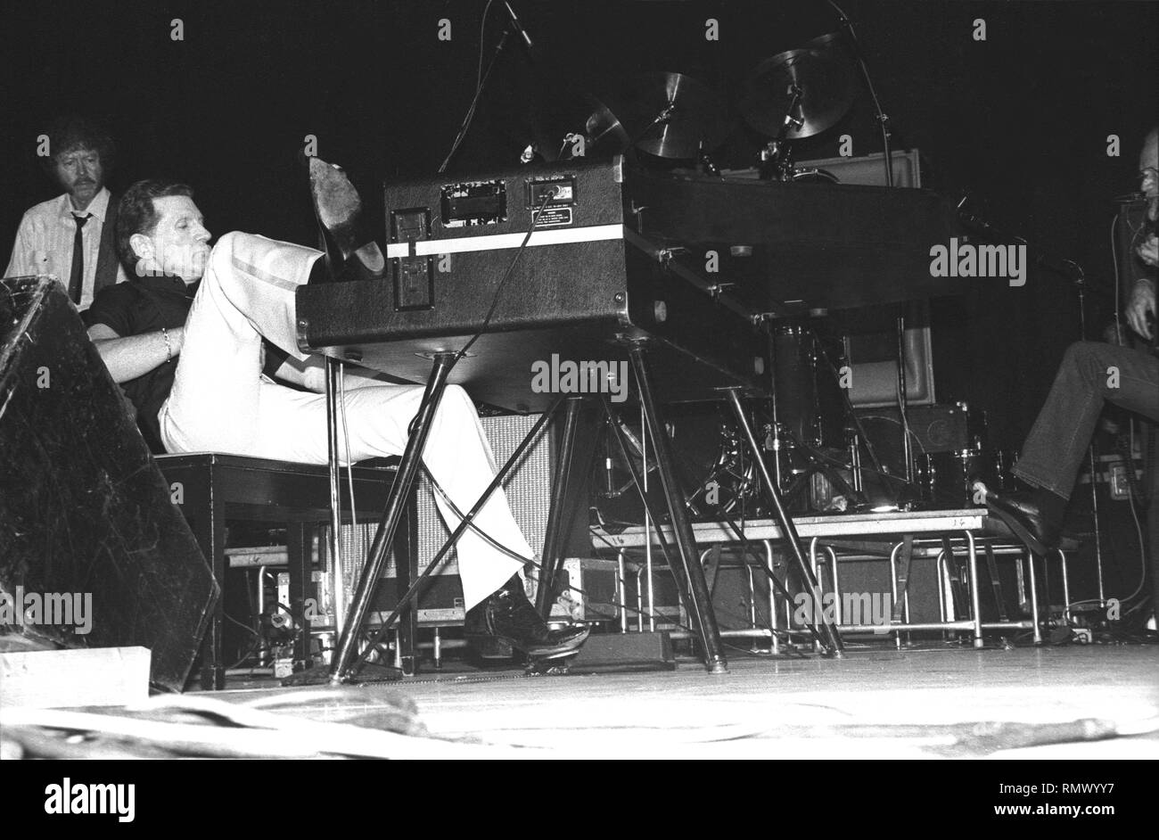 Musician Jerry Lee Lewis is shown performing on stage during a 'live' concert appearance. Stock Photo