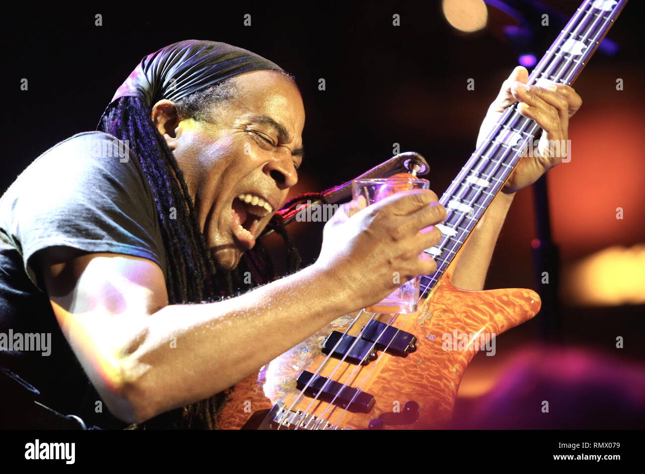 Bassist Doug Wimbish is shown performing on stage during a 'live' concert appearance with Living Colour. Stock Photo