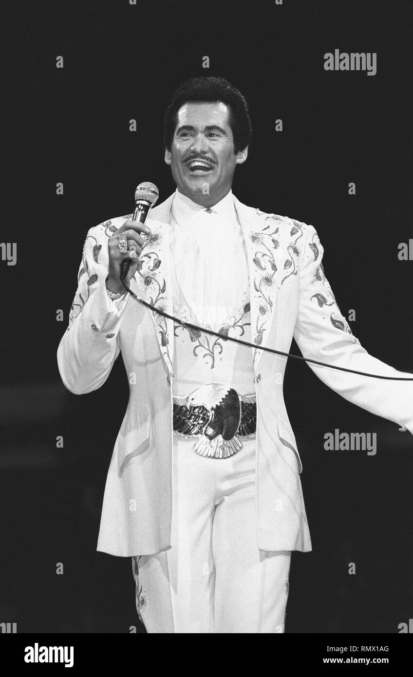 Singer and entertainer Wayne Newton is shown performing on stage during a 'live' concert appearance. Stock Photo