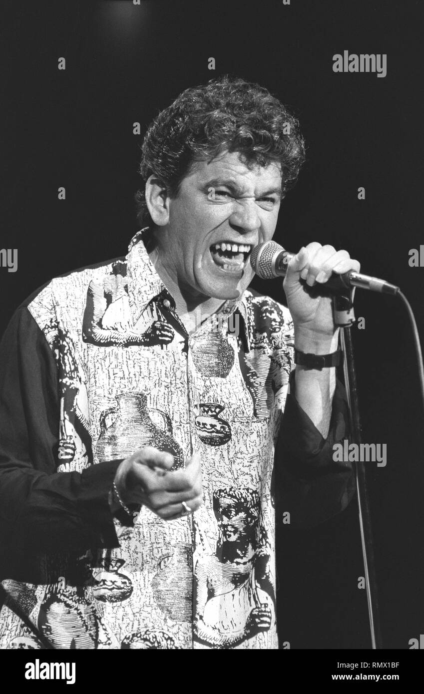 Singer Dan McCafferty of the Scottish hard rock band Nazareth is shown performing on stage during a 'live' concert appearance. Stock Photo