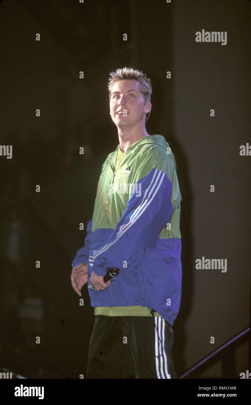 Singer and dancer Lance Bass of the pop group 'N Sync  is shown performing on stage during a 'live' concert appearance. Stock Photo