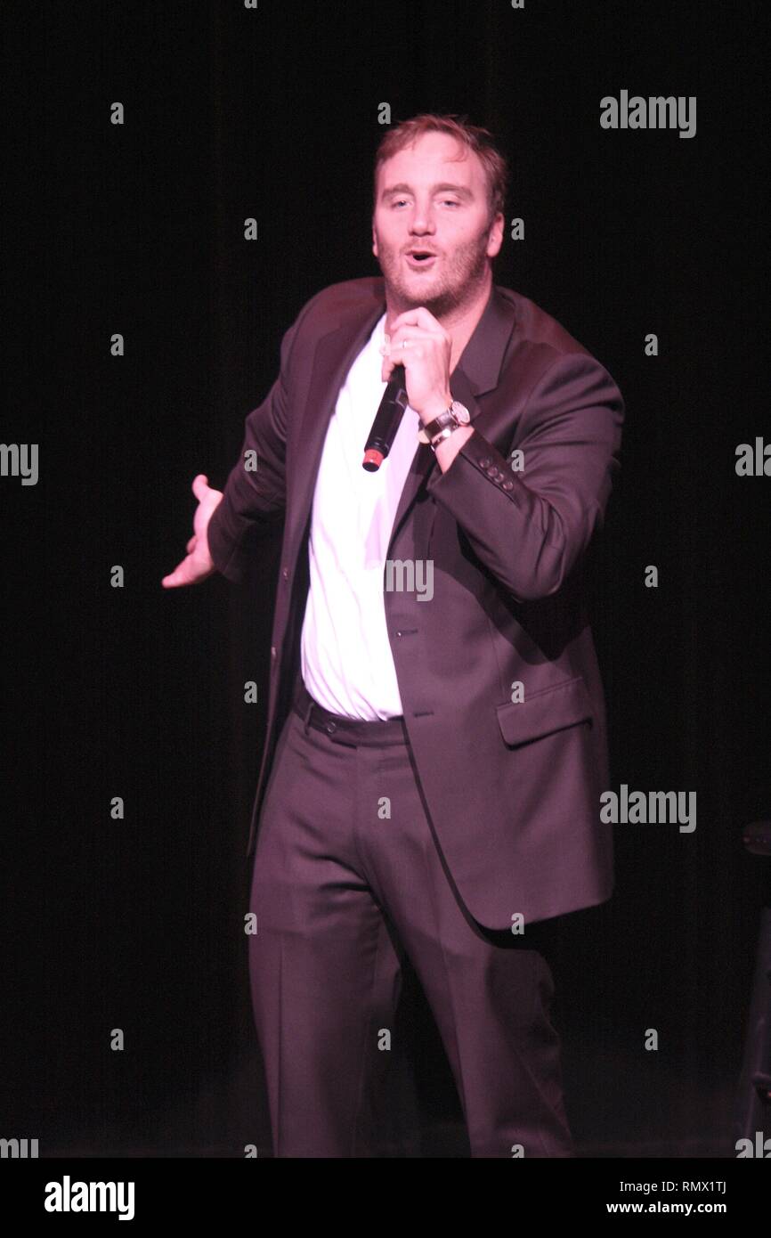 Actor and stand up comedian Jay Mohr is shown performing on stage during a 'live' concert appearance. Stock Photo