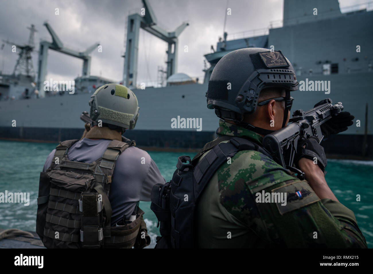 U.S. Navy SEALS with SEAL Team 5 and Royal Thai Navy SEALs conduct