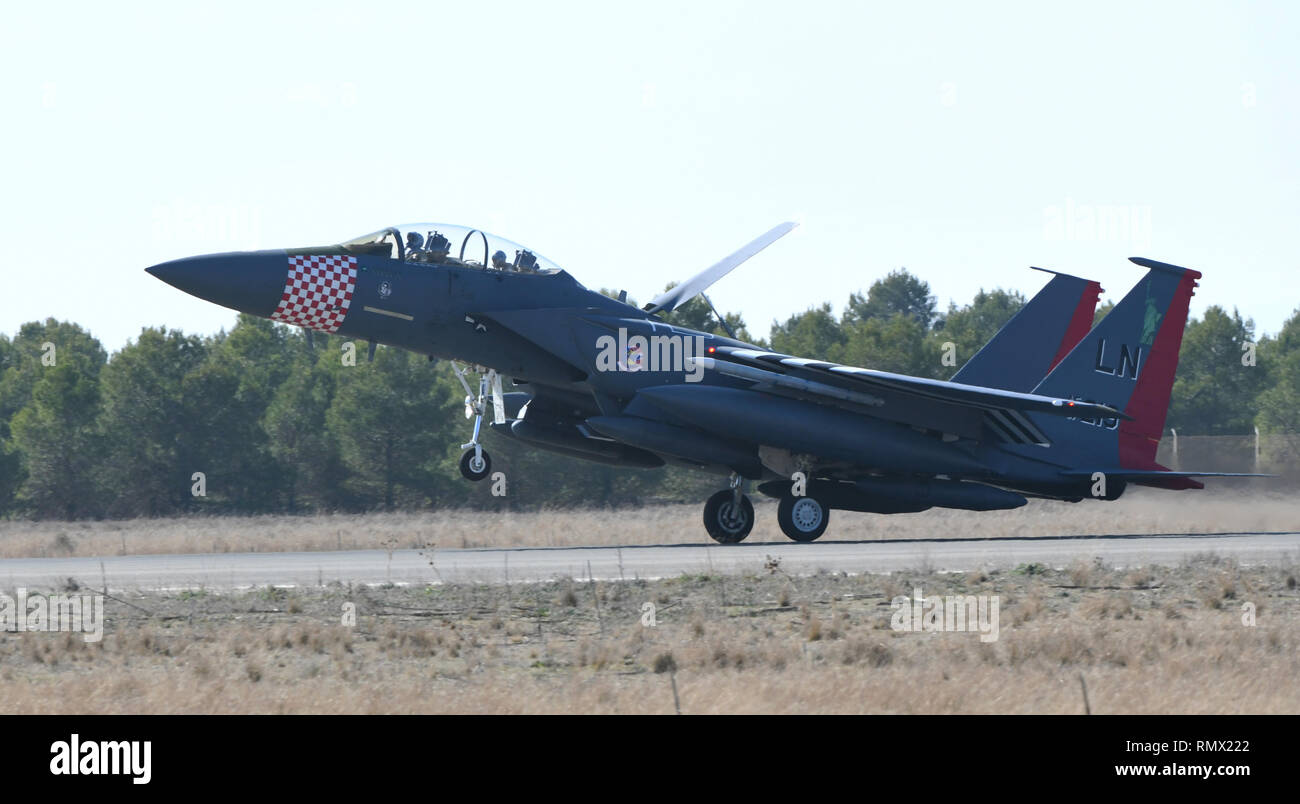 A U.S. Air Force F-15E Strike Eagle from Royal Air Force Lakenheath, England, arrives at Albacete Air Base, Spain, during the NATO Tactical Leadership Programme 19-1 flying course, Feb. 15, 2019. During TLP, U.S. Air Force F-15Es will conduct flying training with other NATO air forces including Spain, France, Greece, Italy, Germany, the United Kingdom and Belgium. (U.S. Air Force photo by Staff Sgt. Alex Fox Echols III) Stock Photo