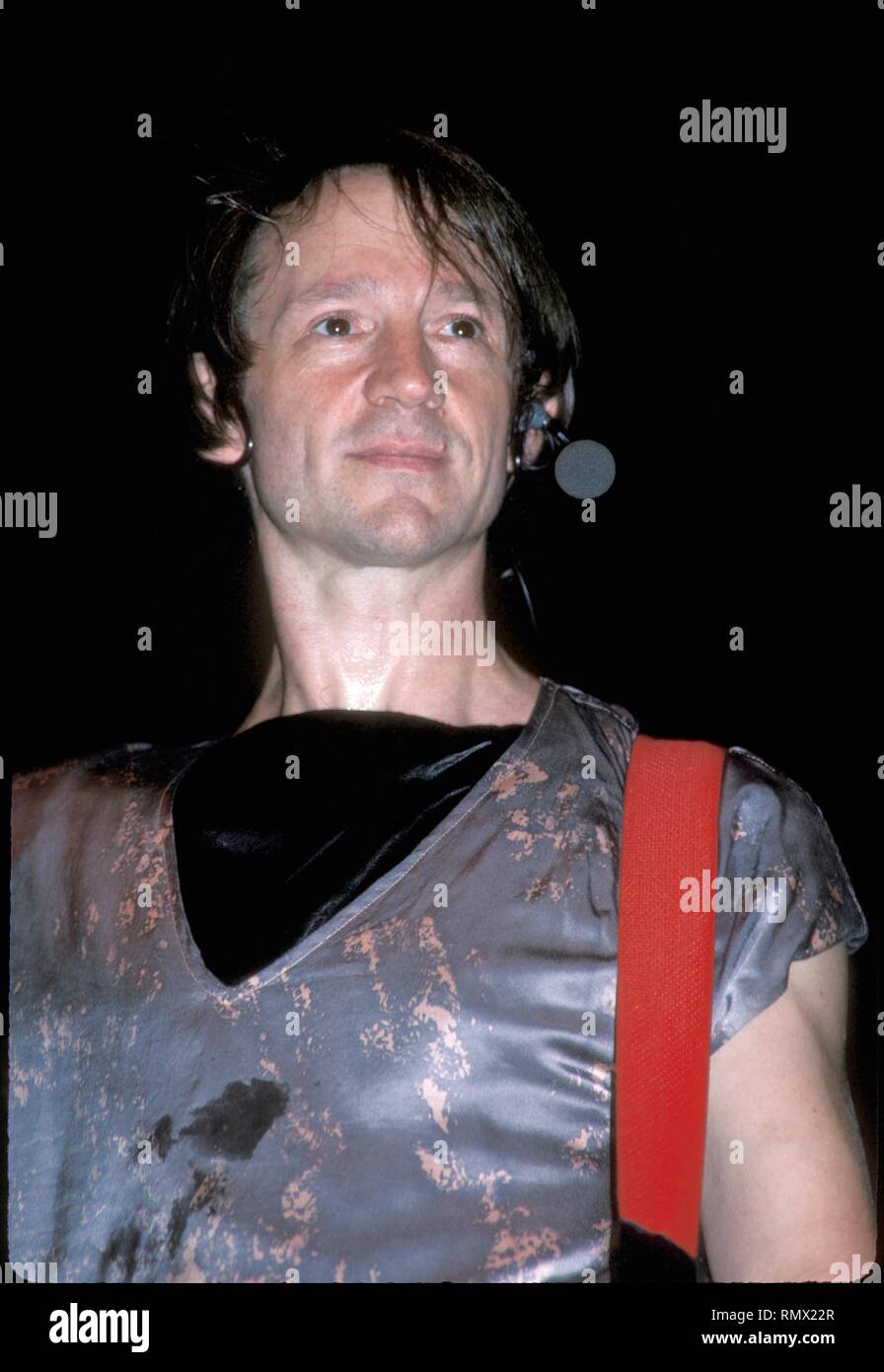 Guitarist and singer Peter Tork of the Monkees is shown performing on stage during a 'live' concert appearance. Stock Photo