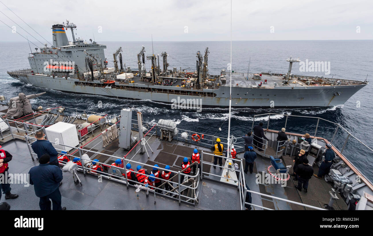 190215-N-WI365-1031 EAST CHINA SEA (Feb. 15, 2019) – The amphibious dock landing ship USS Ashland (LSD 48) prepares to conduct a replenishment-at-sea (RAS) with the fleet replenishment oiler USNS Walter S. Diehl (T-AO 193). Ashland, part of the Wasp Amphibious Ready Group, with embarked 31st Marine Expeditionary Unit, is operating in the Indo-Pacific region to enhance interoperability with partners and serve as a ready-response force for any type of contingency. (U.S. Navy photo by Mass Communication Specialist 2nd Class Markus Castaneda) Stock Photo