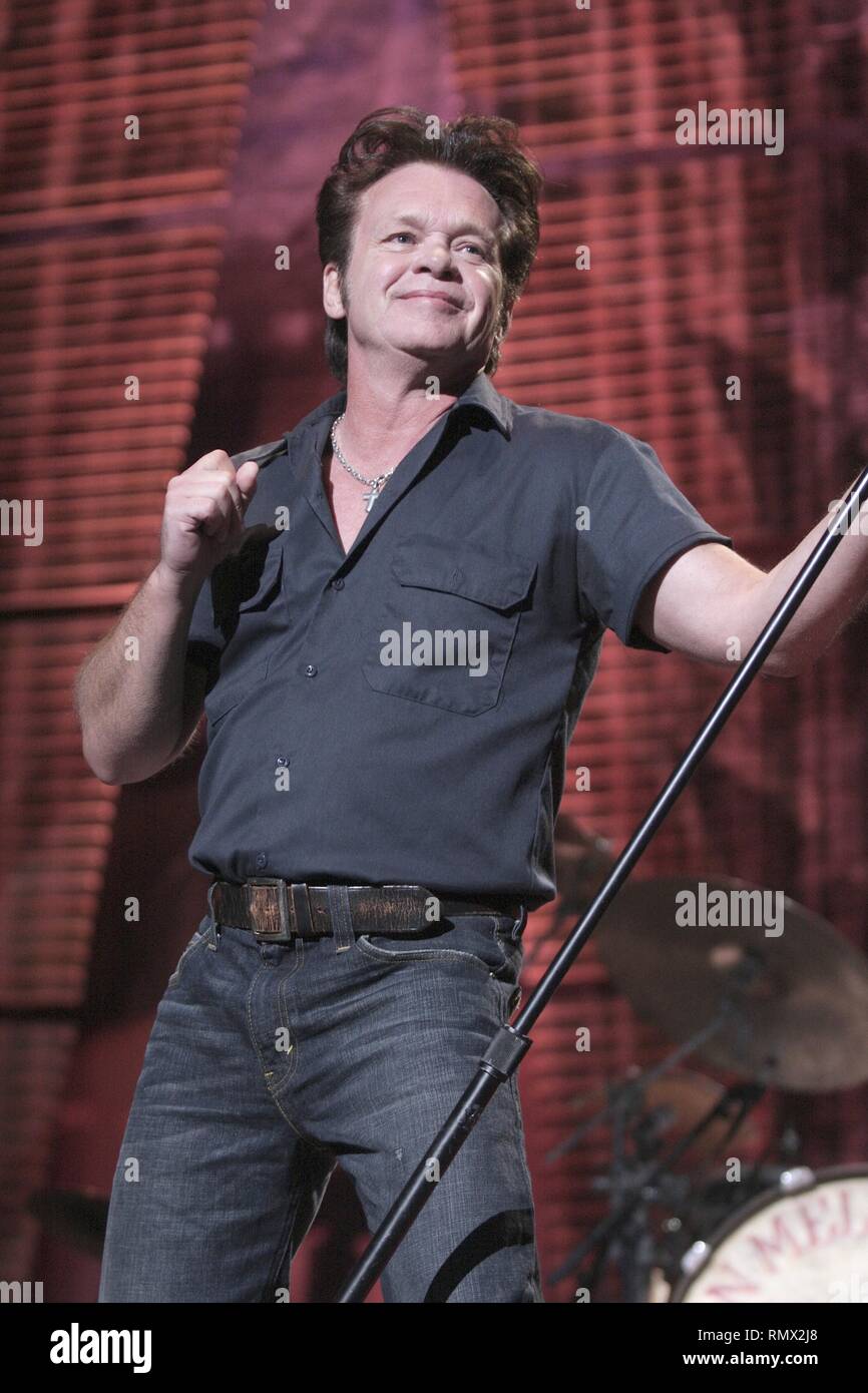 Singer, songwriter and guitarist John Mellencamp is shown performing on stage during a 'live' concert appearance at Farm Aid 2008. Stock Photo