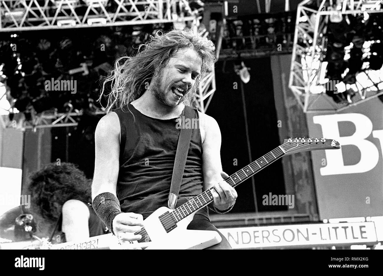 Singer and guitarist James Hetfield of the heavy metal band Metallica is shown performing on stage during a  'live' concert appearance. Stock Photo