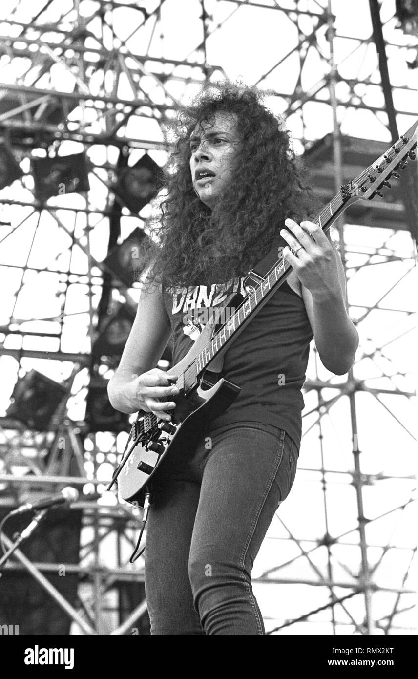 Lead guitarist Kirk Hammett of the heavy metal band Metallica is shown performing on stage during a 'live' concert appearance. Stock Photo