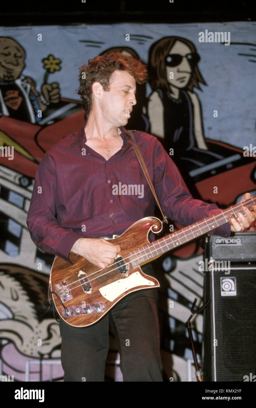 Singer and slide bass player Mark Sandman of the alternative rock group  Morphine is shown performing on stage during a "live" concert appearance  Stock Photo - Alamy