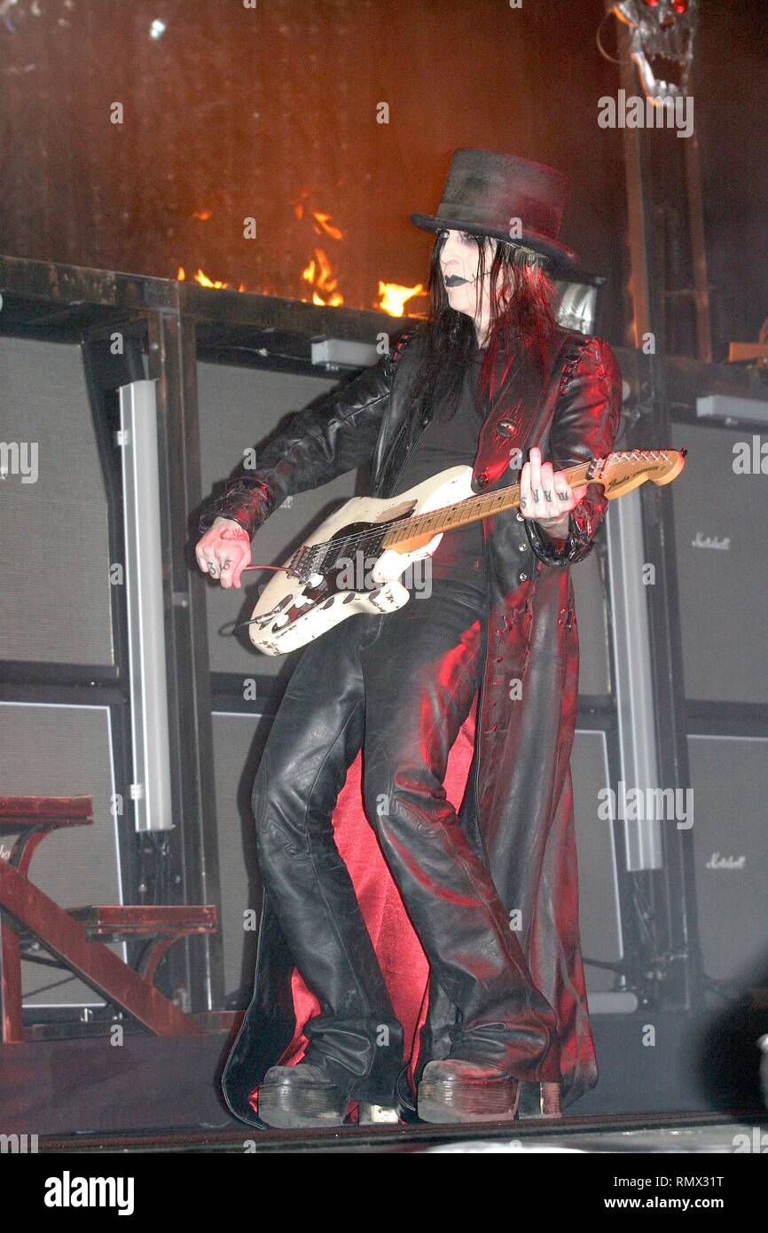 Guitarist Mick Mars of the heavy metal band Motley Crue is shown performing on stage during a 'live' concert appearance. Stock Photo