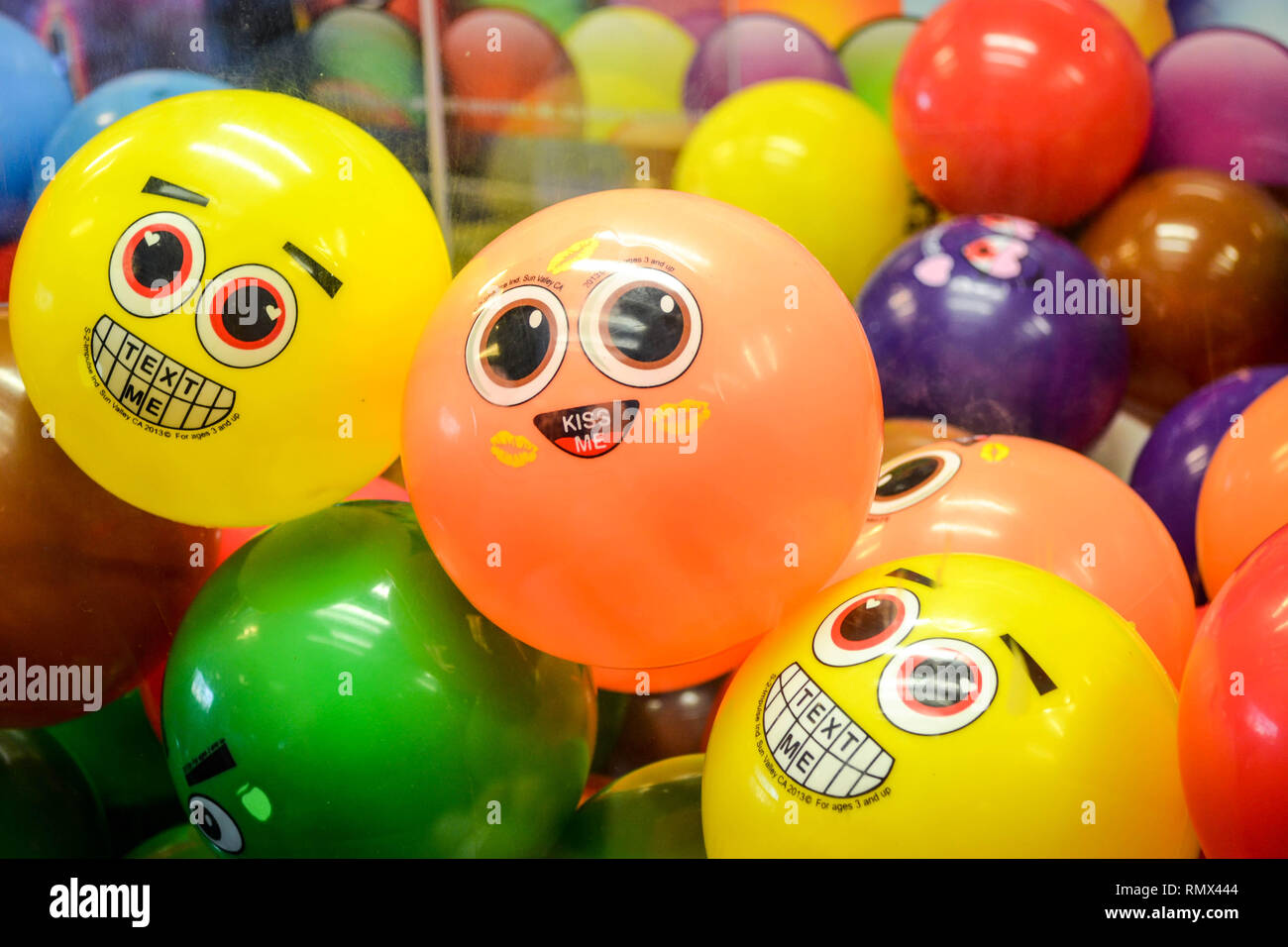 Emoji toy balls with texting messages in a vending machine in Twentynine Palms, California, USA Stock Photo