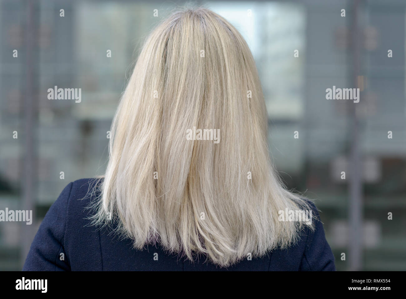 Woman in street rear view hi-res stock photography and images - Alamy