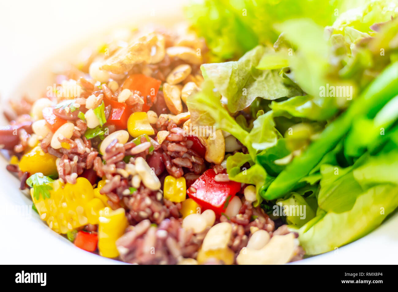 vegetarian food, fried black rice vegetables mix with salad. Stock Photo