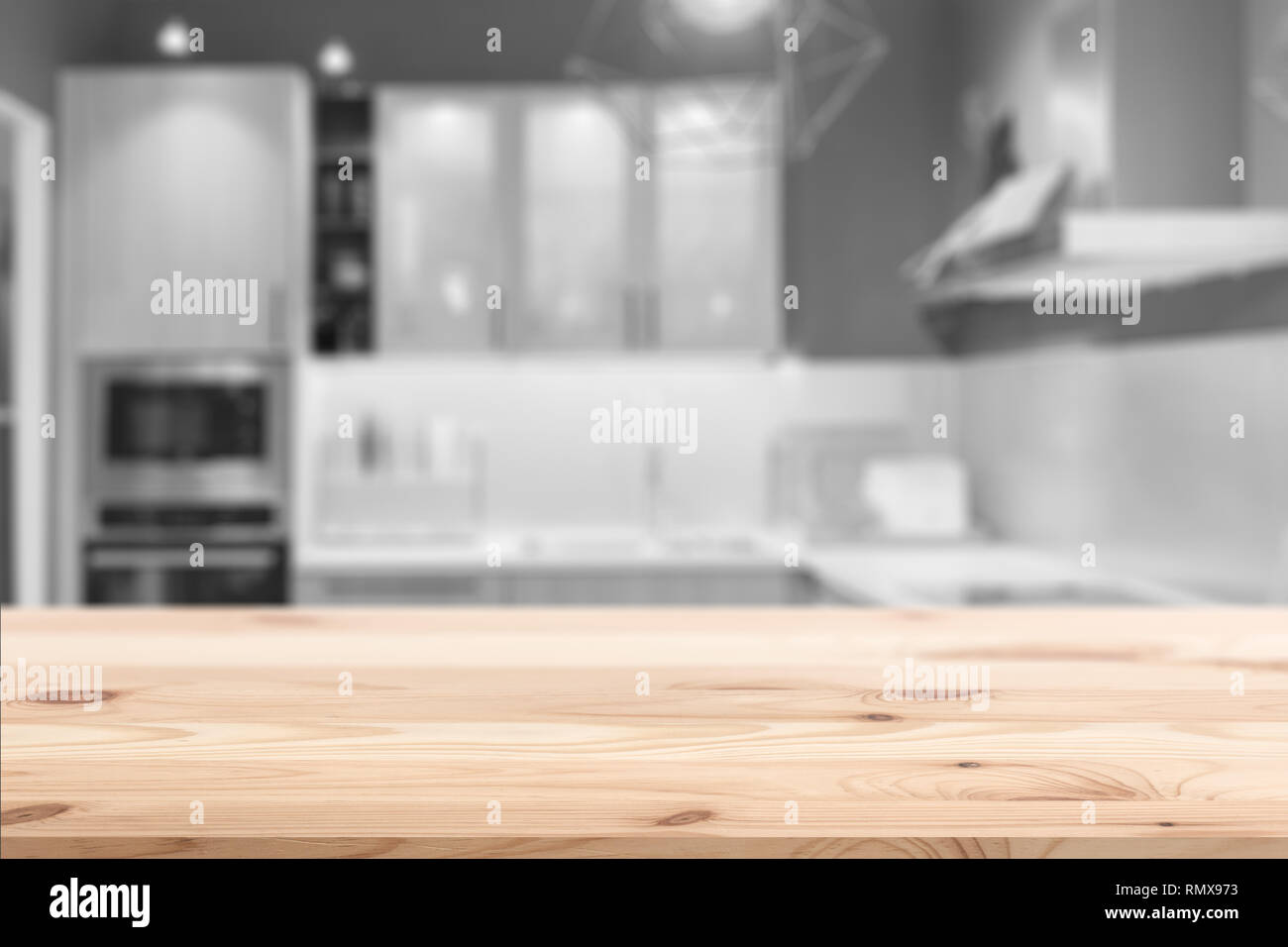 Wood table top on blur clean home kitchen background for montage product display design template. Stock Photo