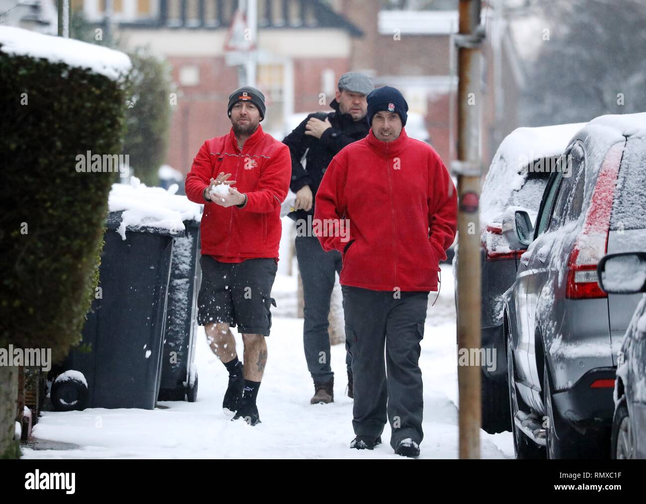 Pic shows: Snow and sleet hampered commuters on their work today in East Finchley, North London  This postman played a prank on his mate not he way to Stock Photo