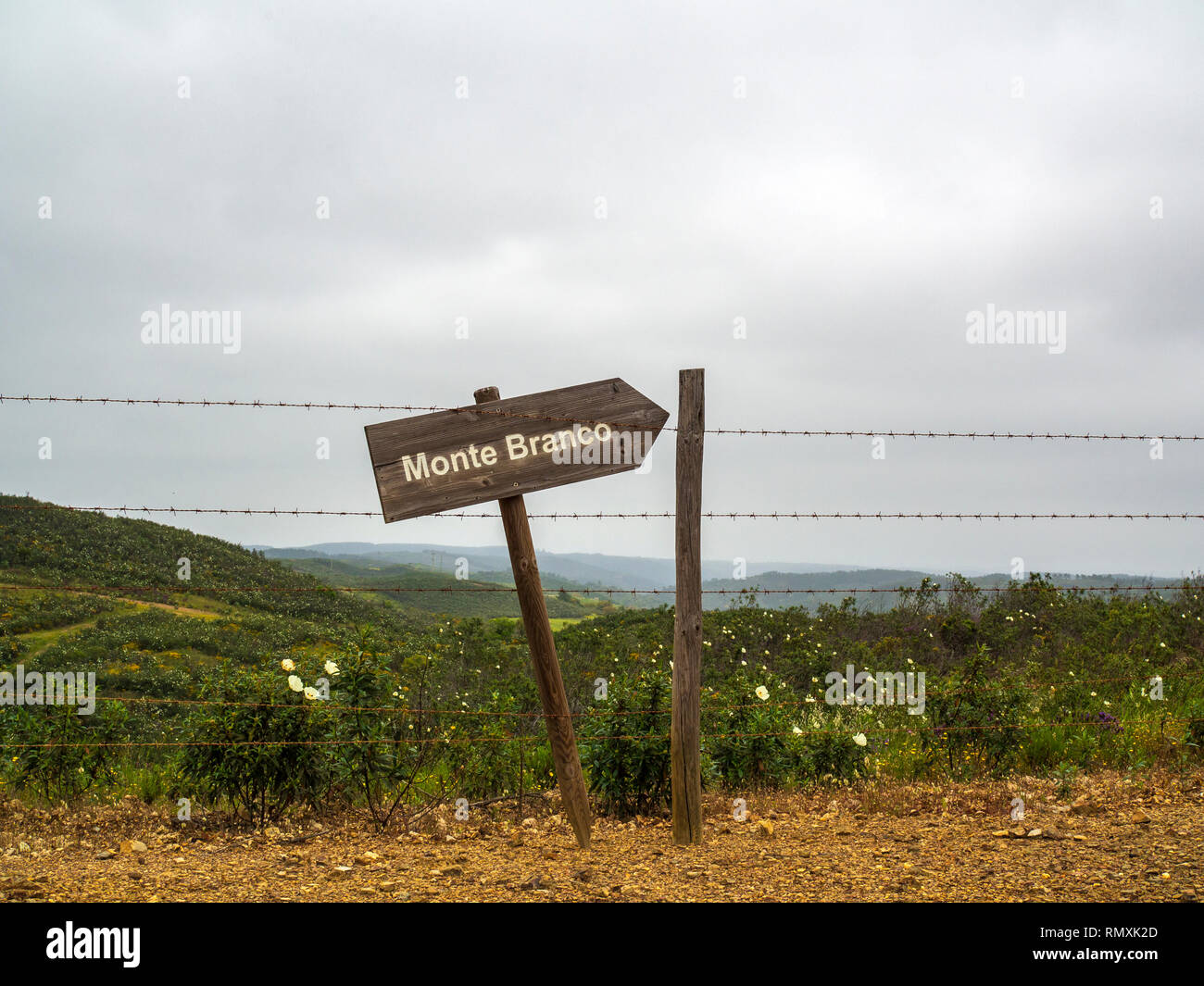 A sign pointing toward Monte Branco in southern Portugal. Stock Photo