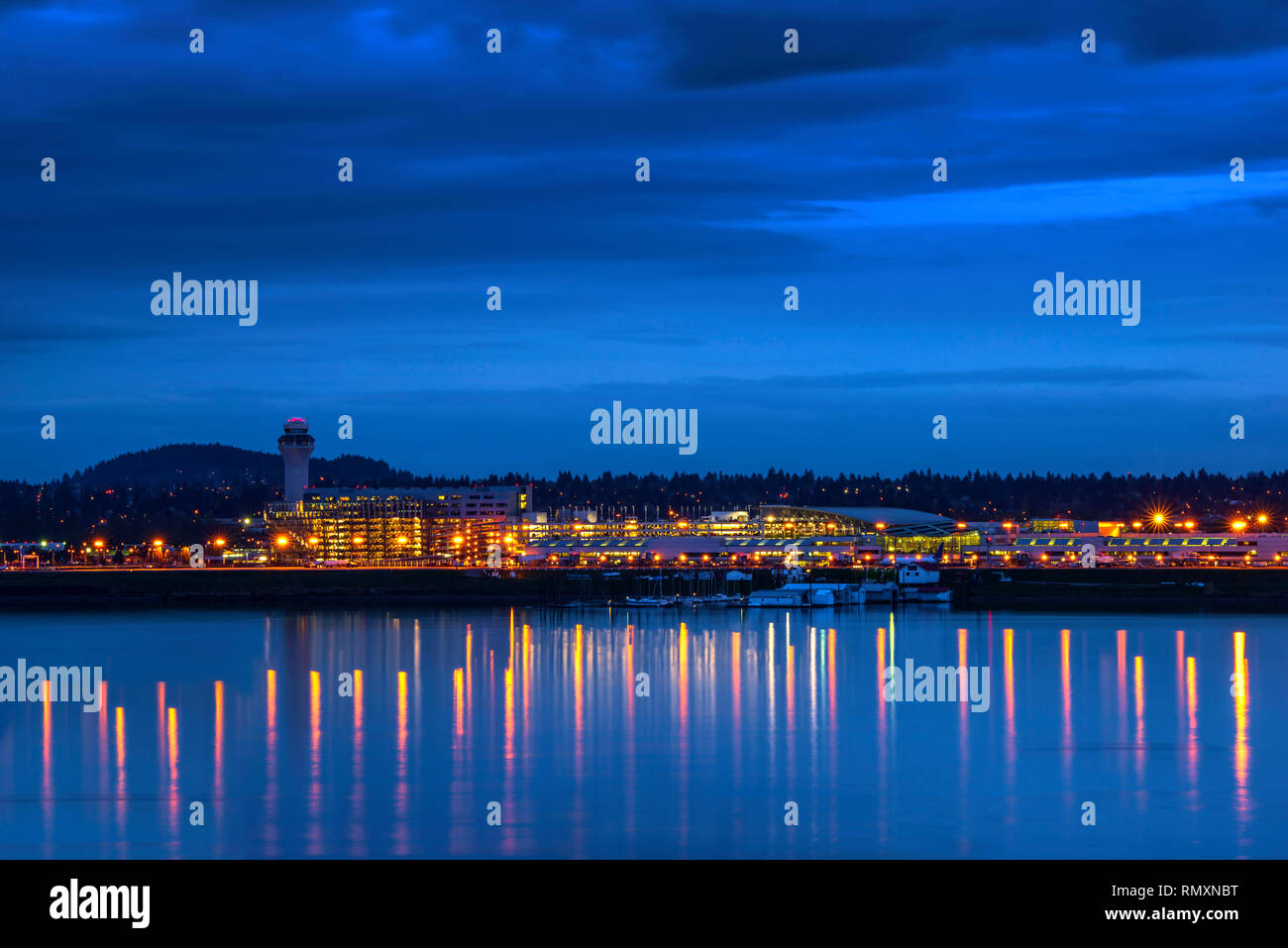 Evening view of the PDX Portland airport with traffic control tower