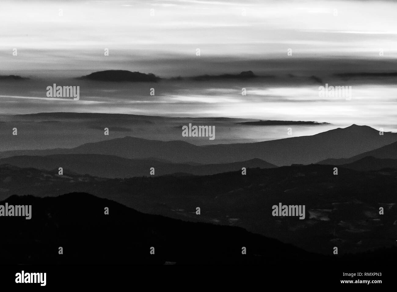 sky at dusk, with mountains layers Stock Photo Alamy