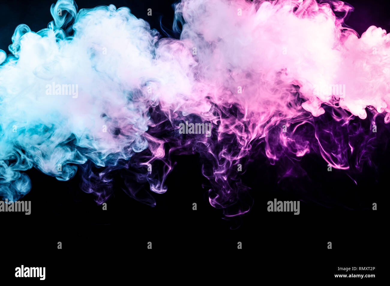 Fog colored with bright pink and blue smoke on dark background Stock Photo  - Alamy