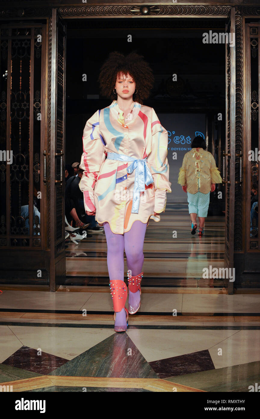 Female model walks during the C'est D By Doyeon Yoni Yu catwalk show at the  London Fashion Week 2019 in Freemasons Hall Stock Photo - Alamy
