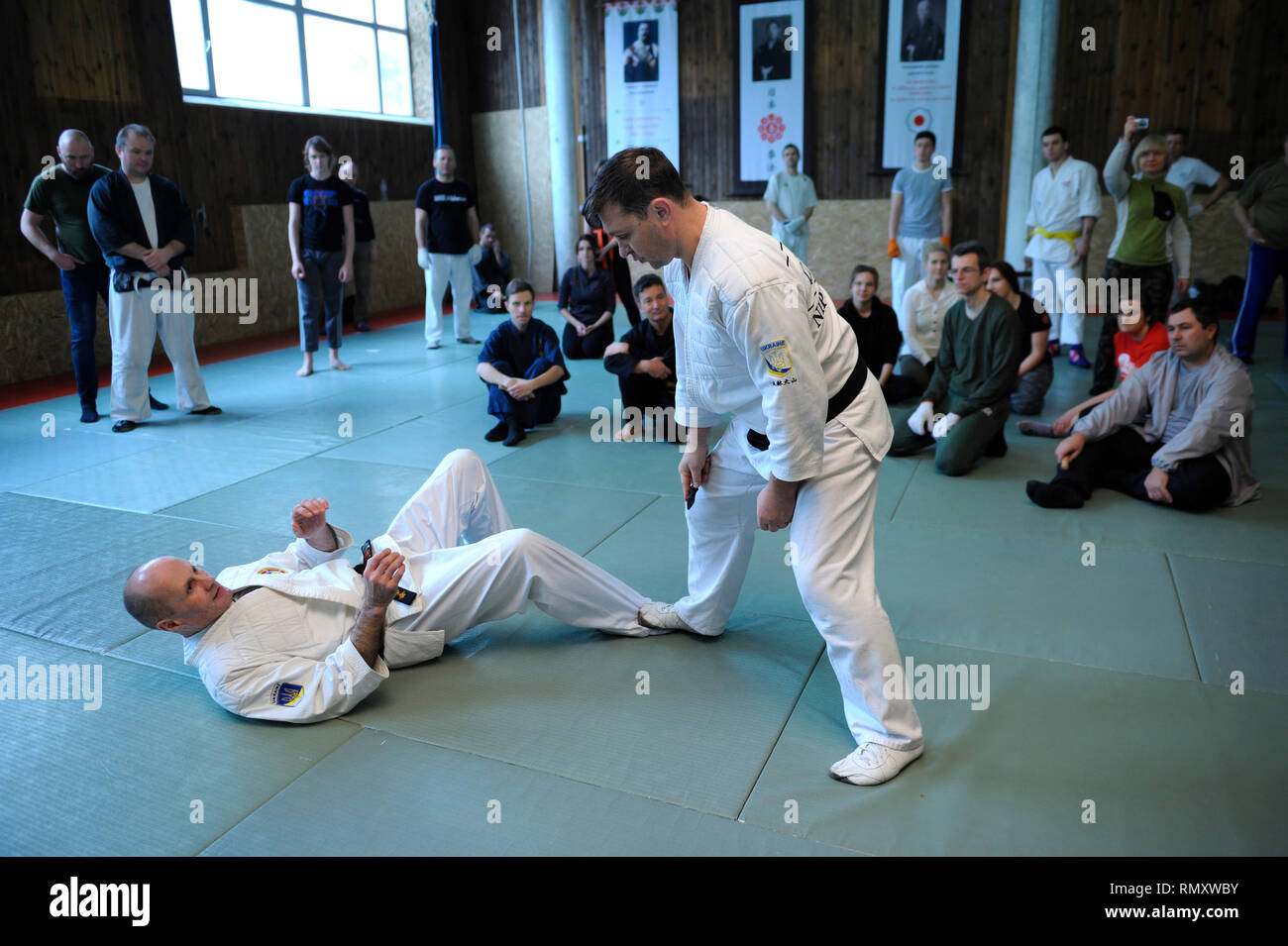 Nippon kempo instructors teaching of self protection using improvised