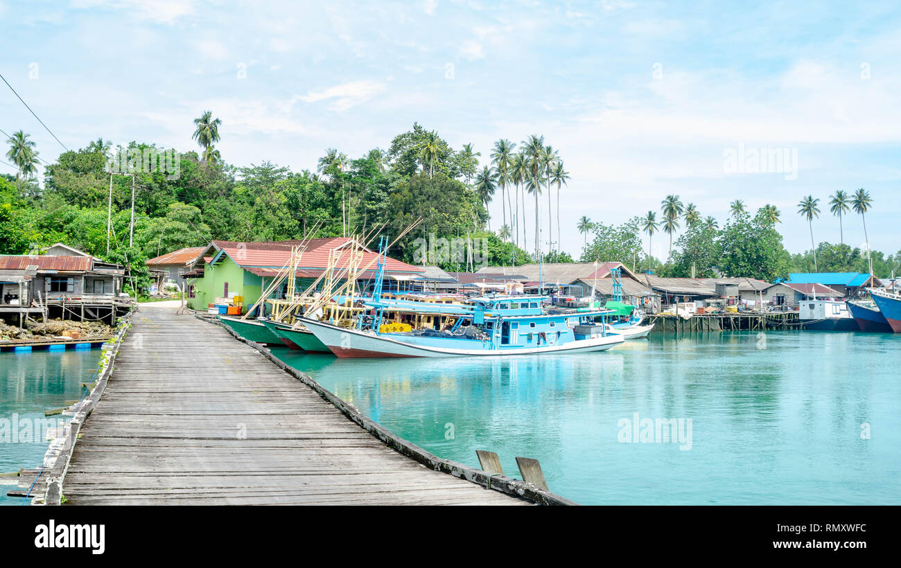traditional fisherman's boat docked in the harbor, Labuhan cermin, Berau, Indonesia.. Labuhan Cermin is one of tourist resort in Indonesia Stock Photo