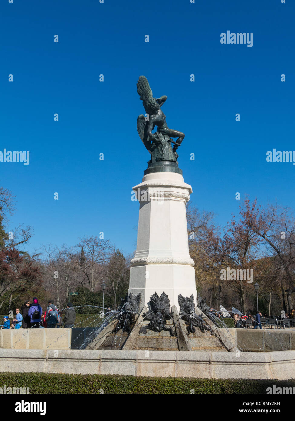 Madrid, Spain - January 27, 2018: Fountain of Fallen Angel (Fuente del Angel Caido, by Ricardo Bellver, 1877) - highlight of Buen Retiro Park. Buen Re Stock Photo