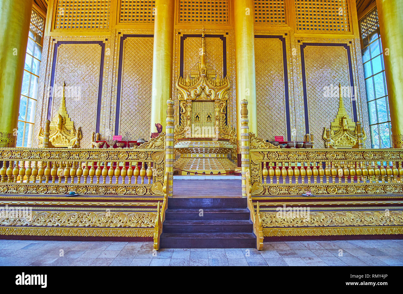 BAGO, MYANMAR - FEBRUARY 15, 2018: The stunning Thihathana or Lion Throne in Great Audience Hall of Kanbawzathadi Golden palace, on February 15 in Bag Stock Photo