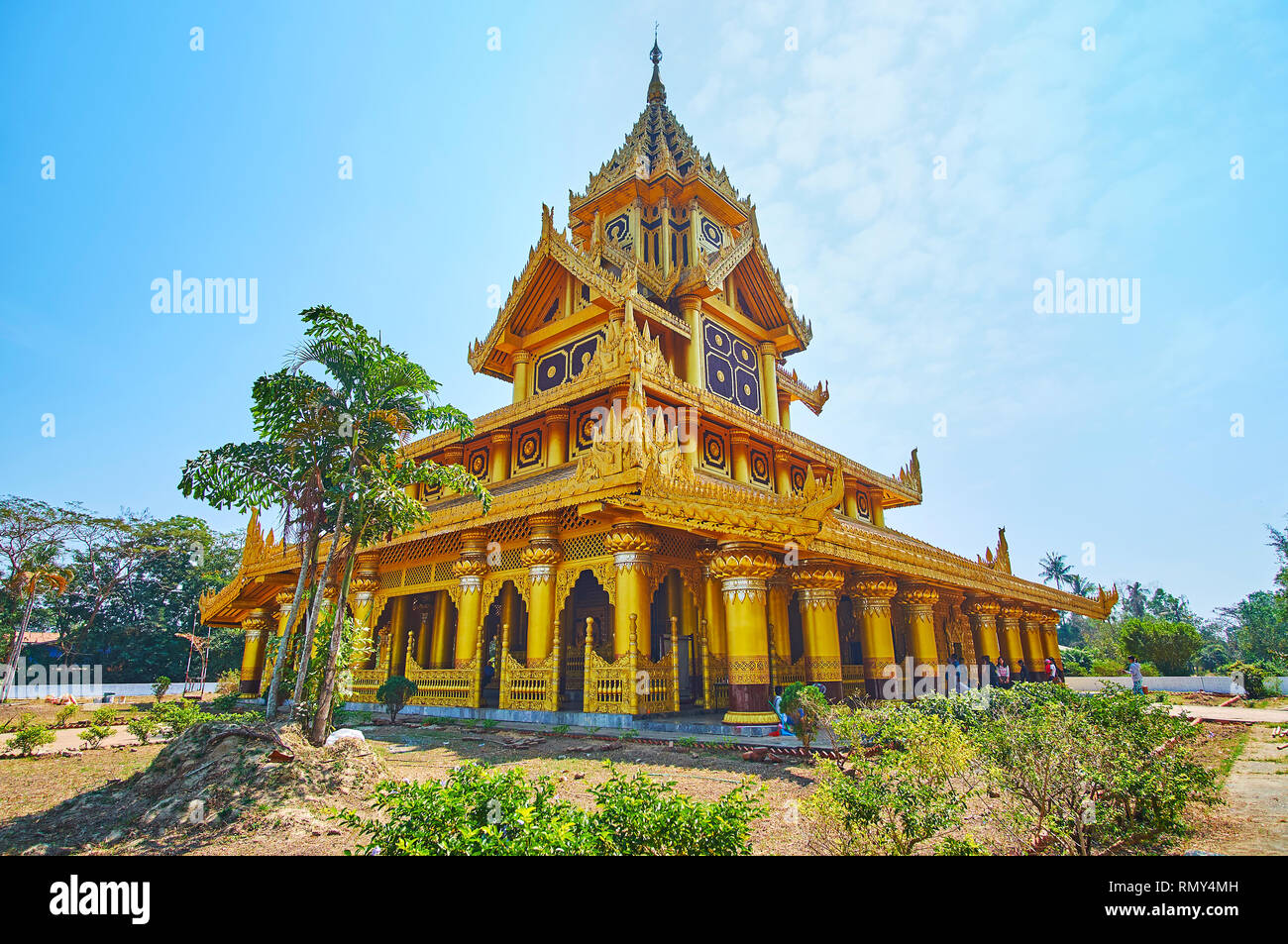 BAGO, MYANMAR - FEBRUARY 15, 2018: The gilded Bee (Bhammayarthana) Throne Hall of Kanbawzathadi palace with many strong columns, nice carved wooden de Stock Photo