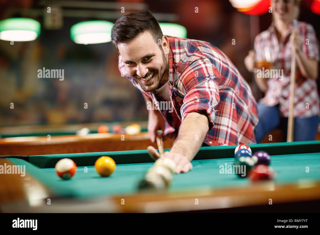 Man At Pool Table Young man standing at pool table hi-res stock photography and images ...