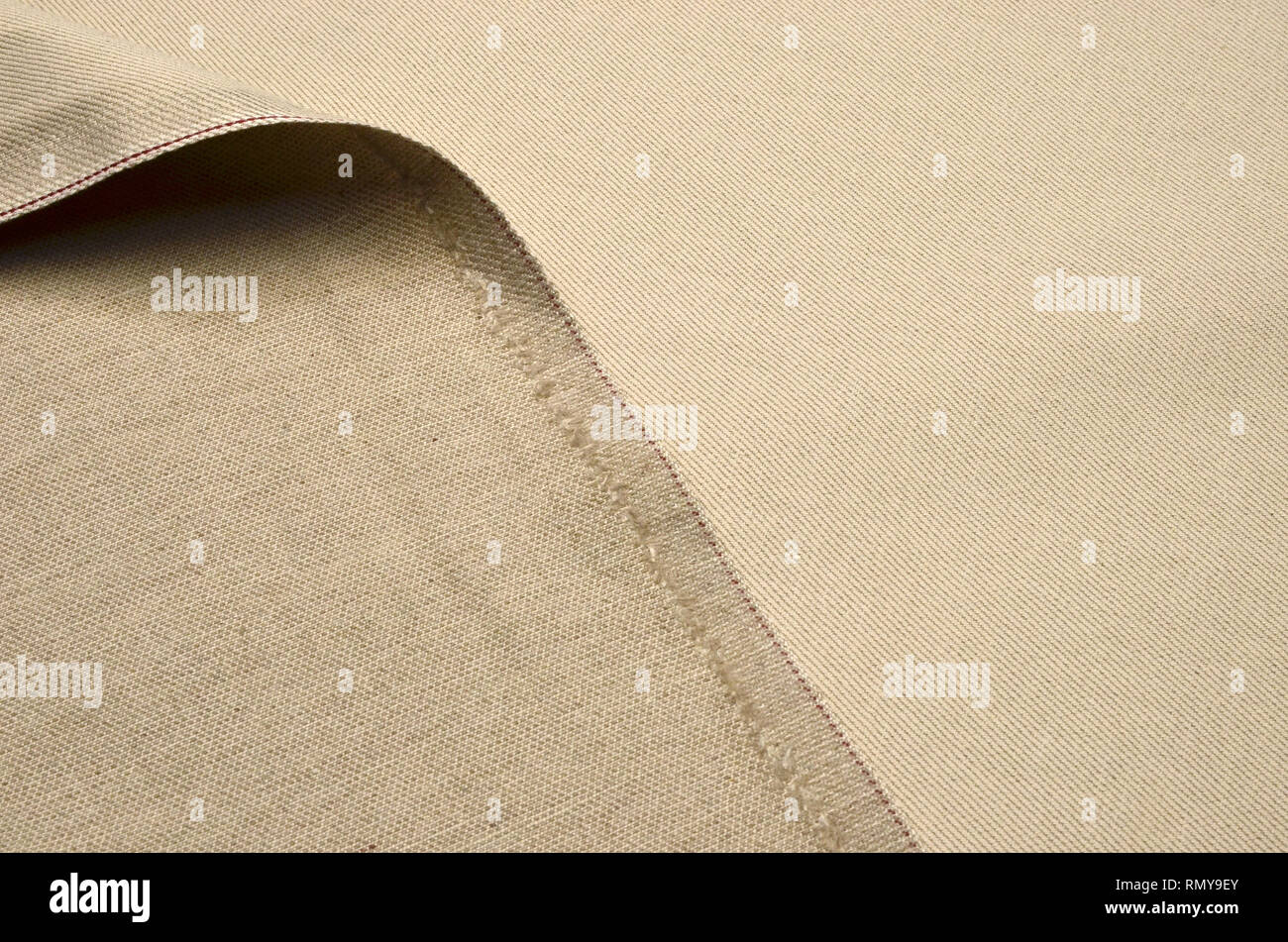Cotton fabric, light beige, melange Stock Photo - Alamy