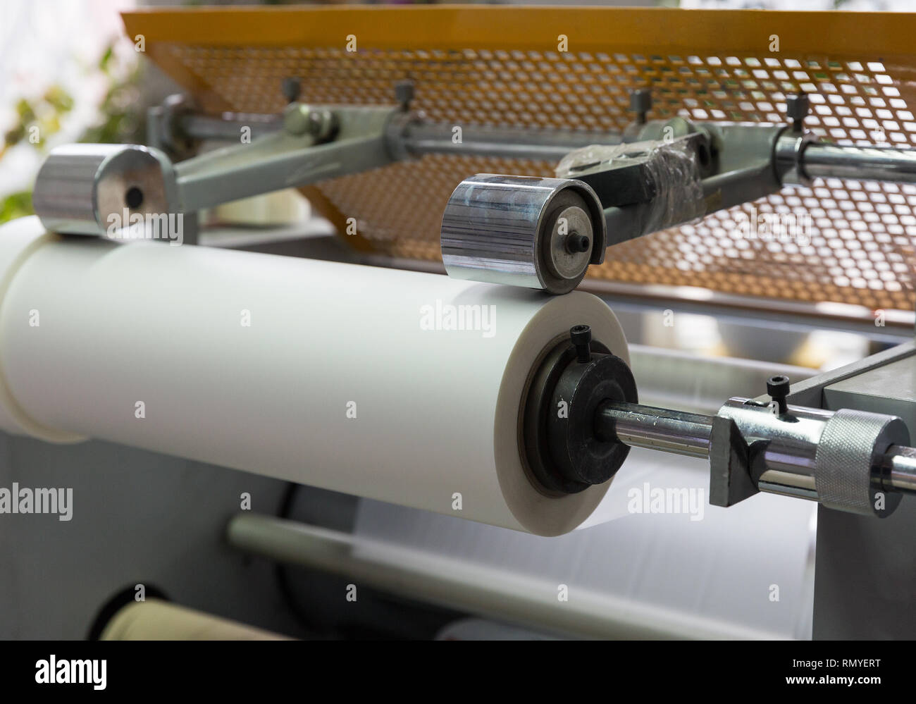 paper roll machine, cut and fold, closeup Stock Photo Alamy