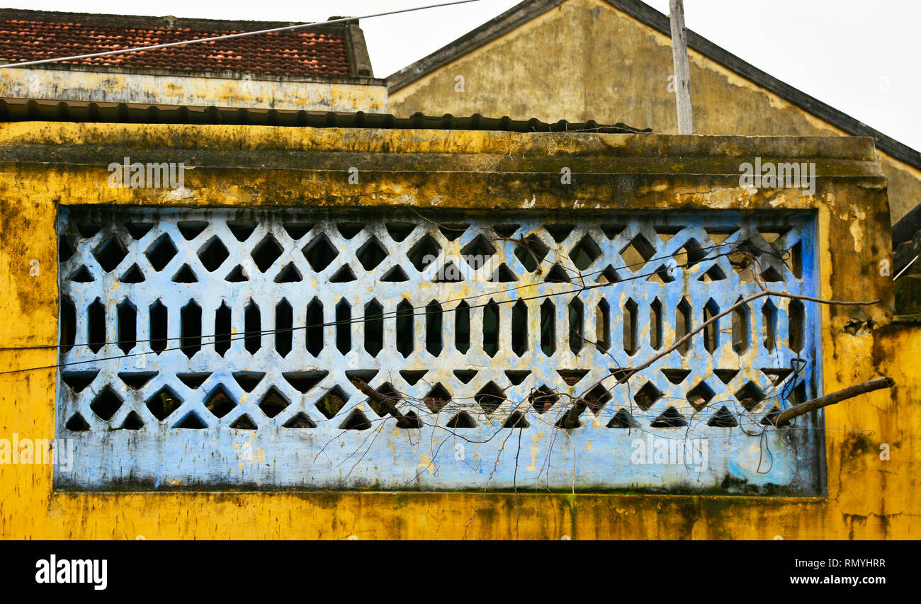 Details from a wall in the historic UNESCO listed central Vietnamese